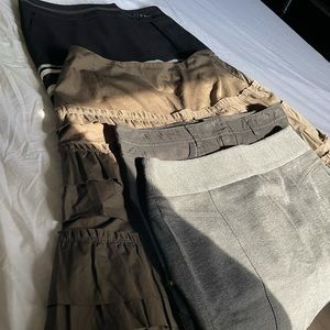 White House Black Market.  4 skirts . Size 2.